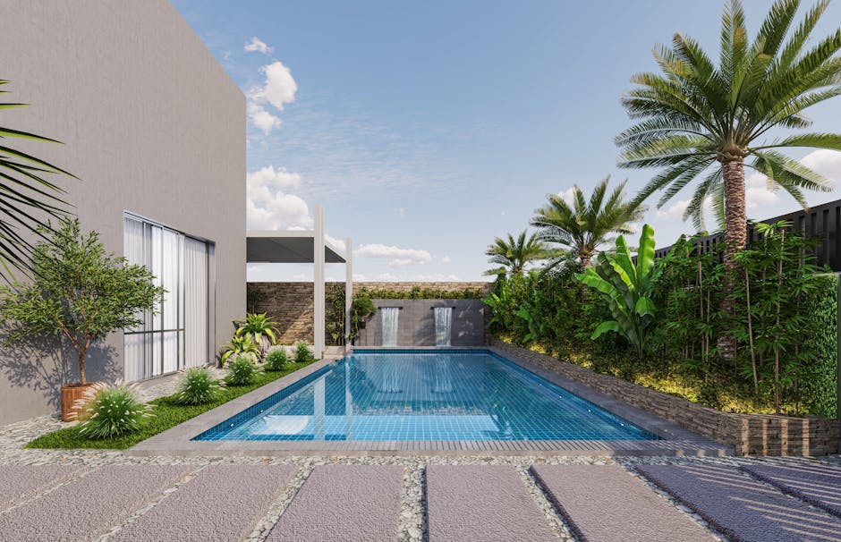 Εντυπωσιακός χώρος πολυτελούς πισίνας με τροπικά φυτά.